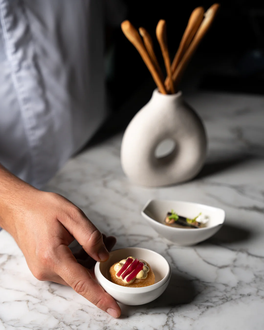 Il benvenuto dello chef con amuse-bouche e grissini